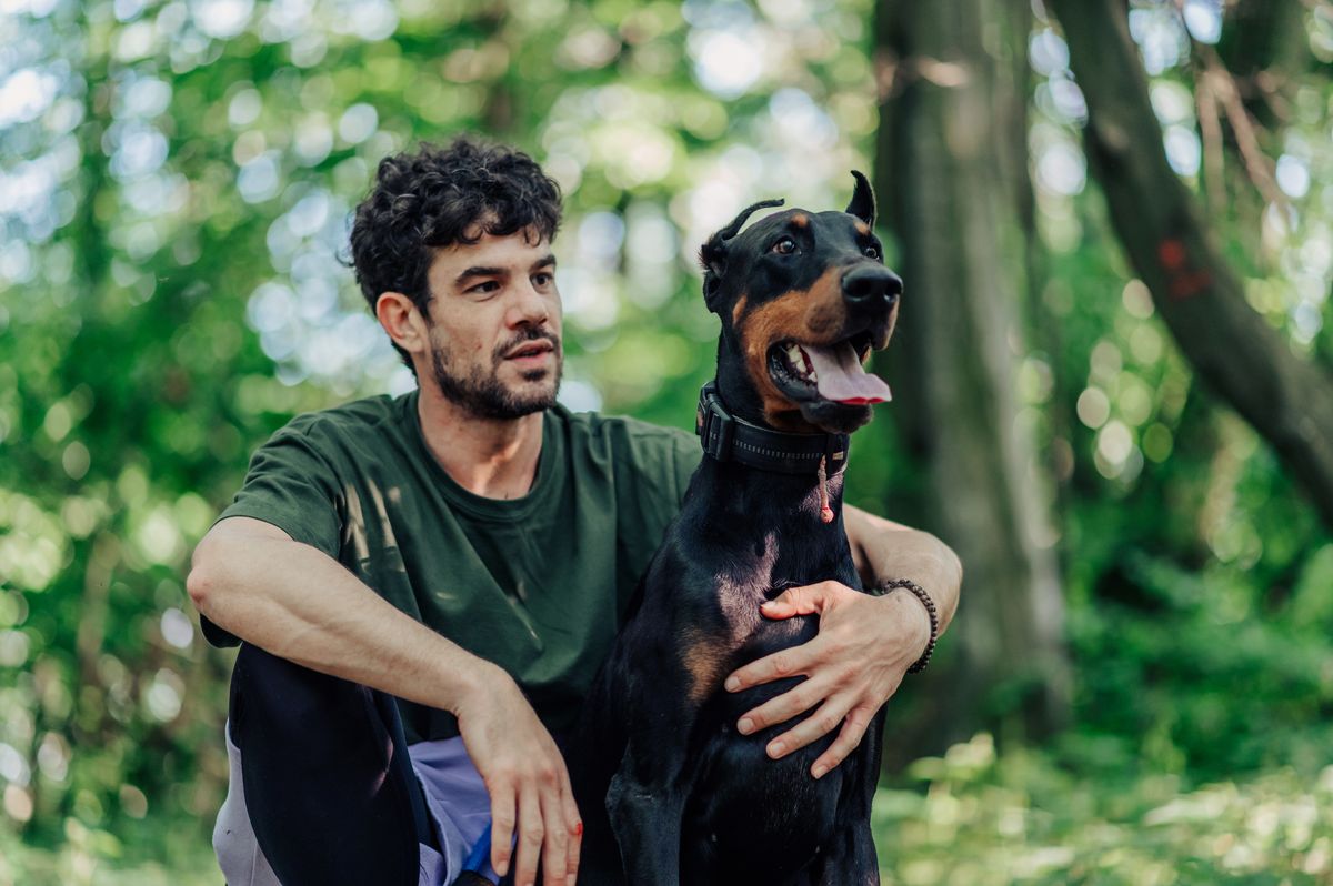 Doberman with owner